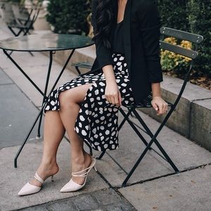 Black and white spotted midi skirt with leg slit